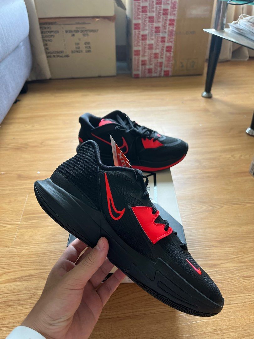 Kyrie low triple black on feet top