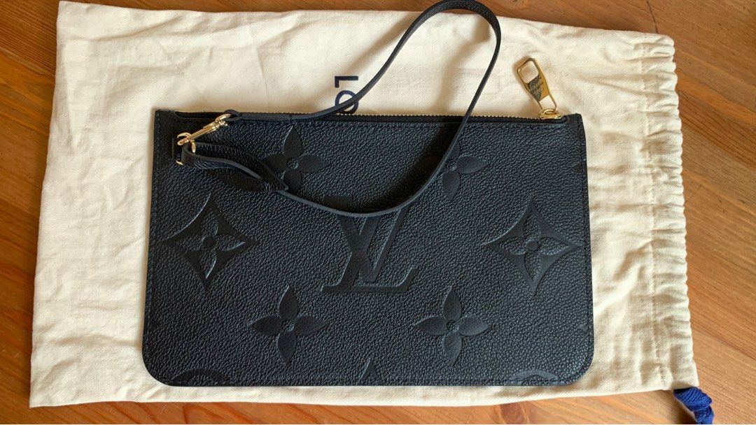 LV Neverfull MM pouch (Category: Luxury Bags & Wallets) located in Malolos. Submitted by flapnbloom.ph (Listing ID 1240512534, Image 1). Description: LV pouch in Empreinte leather, Black, bought it brand new and carried once only, with dustbag Dimension L: 25cm x H:15.5cm Removable strap is long enough to convert it to shoulder bag. MOP: Bank transfer/GCash Pm for inquiries.