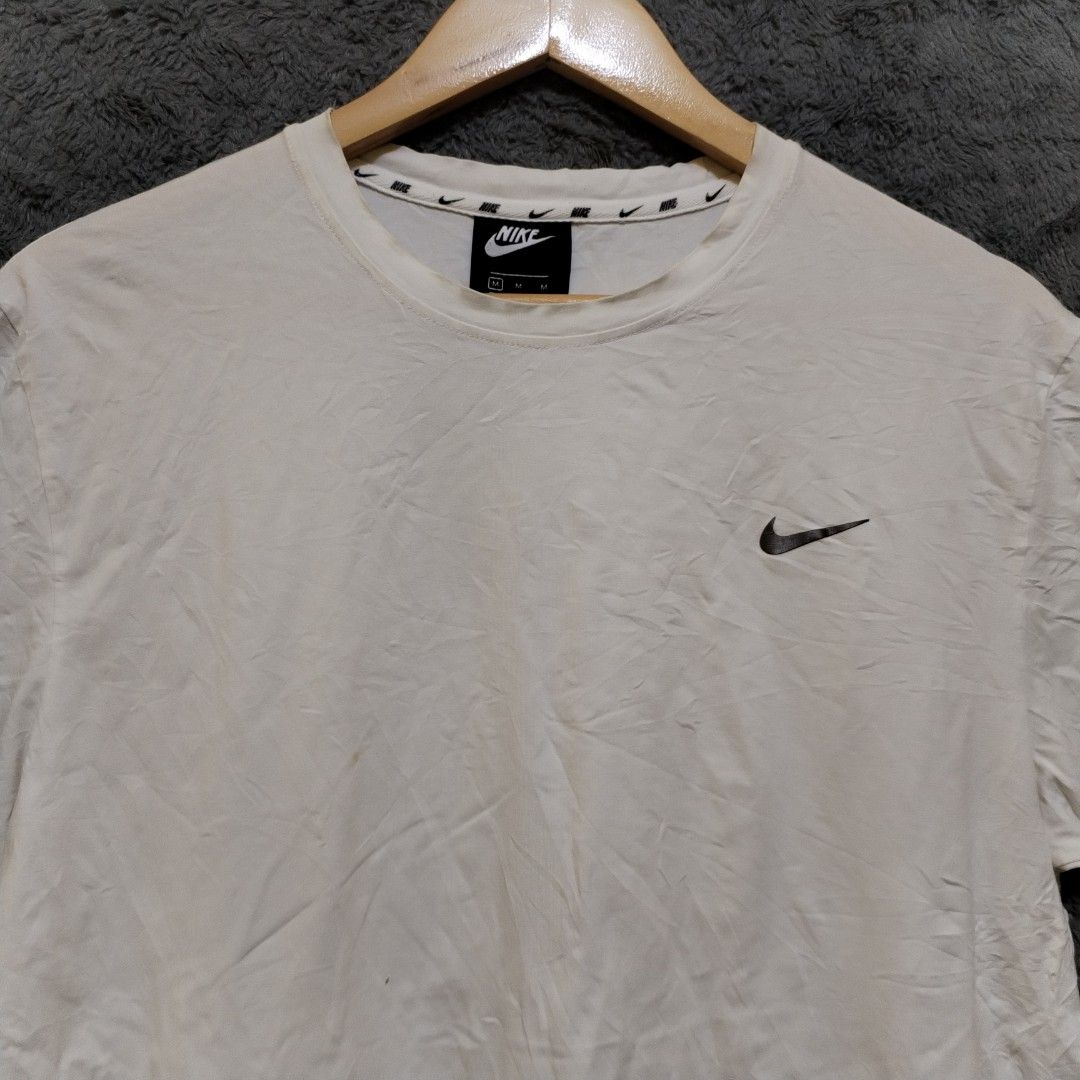 white nike men shirt
