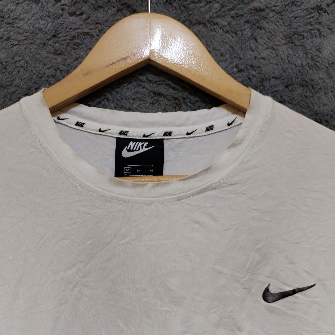 mens white and black nike shirt