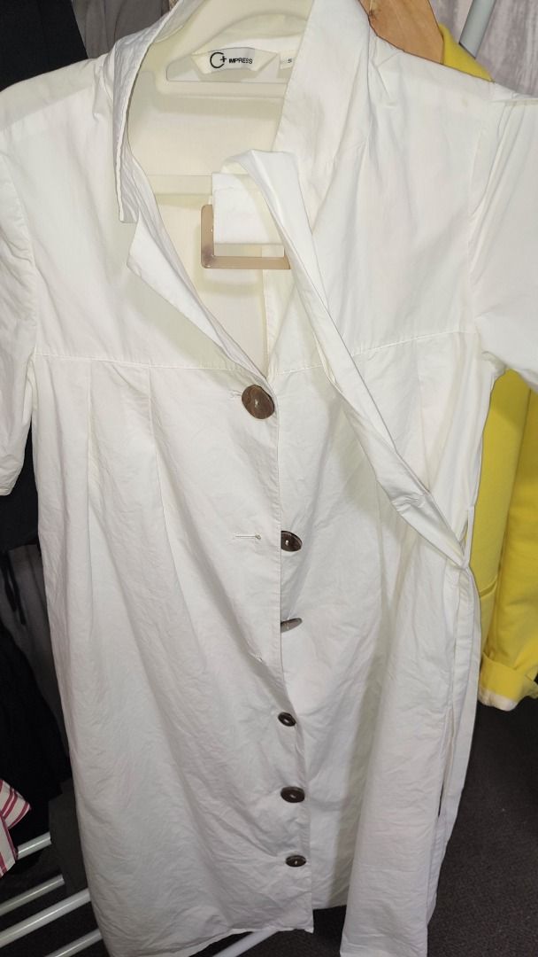 White Midi Dress (Category: Dresses) located in Quezon City. Submitted by kimpossibleme (Listing ID 1240482754, Image 2). Description: Midi dress. Thick and nice fabric. Parang linen and twill blend. Has tiny washable mark due to storage. With belt. Fits M..