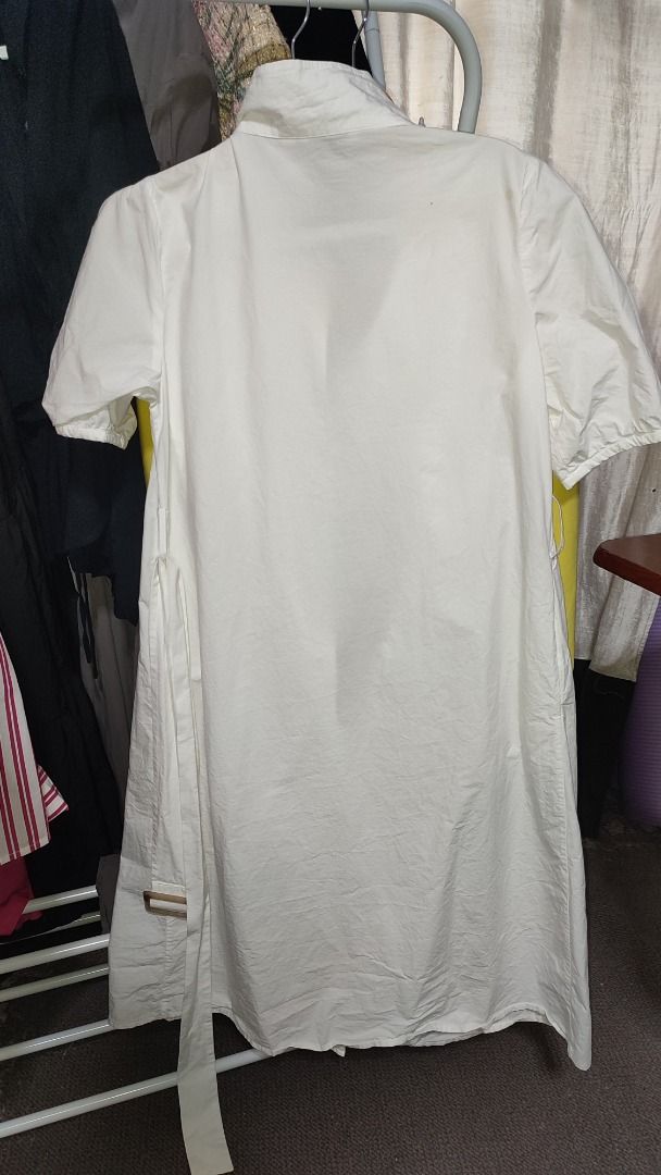 White Midi Dress (Category: Dresses) located in Quezon City. Submitted by kimpossibleme (Listing ID 1240482754, Image 3). Description: Midi dress. Thick and nice fabric. Parang linen and twill blend. Has tiny washable mark due to storage. With belt. Fits M..