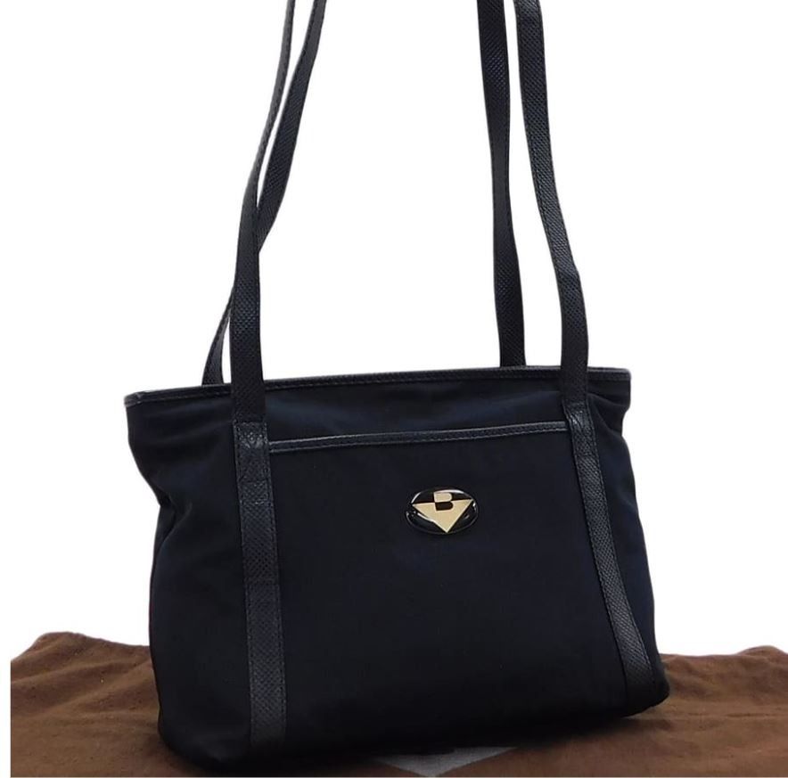 Bottega Veneta Nylon Shoulder Bag (Category: Luxury Bags & Wallets) located in Cabuyao City. Submitted by reinne66 (Listing ID 1242284599, Image 1). Description: Pre-Loved Bottega Veneta Nylon Shoulder Bag with Original dustbag and mirror Bought this item in Japan thus guaranteed authentic (money back if proven fake). Actual photos posted, please send me a PM for additional photos or video Size: H (height): 20cm x W (width): 24cm x D (width) 7cm 