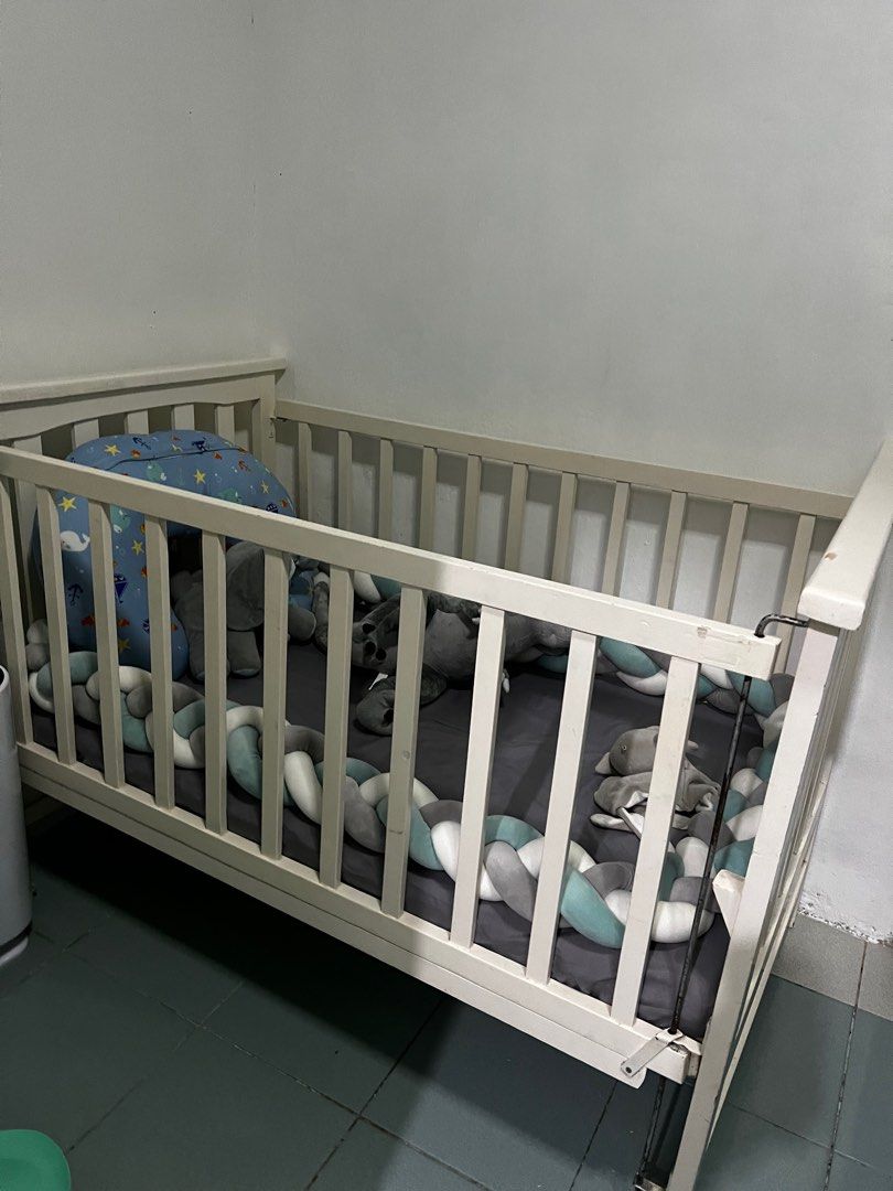 Crib with drop side set on Carousell