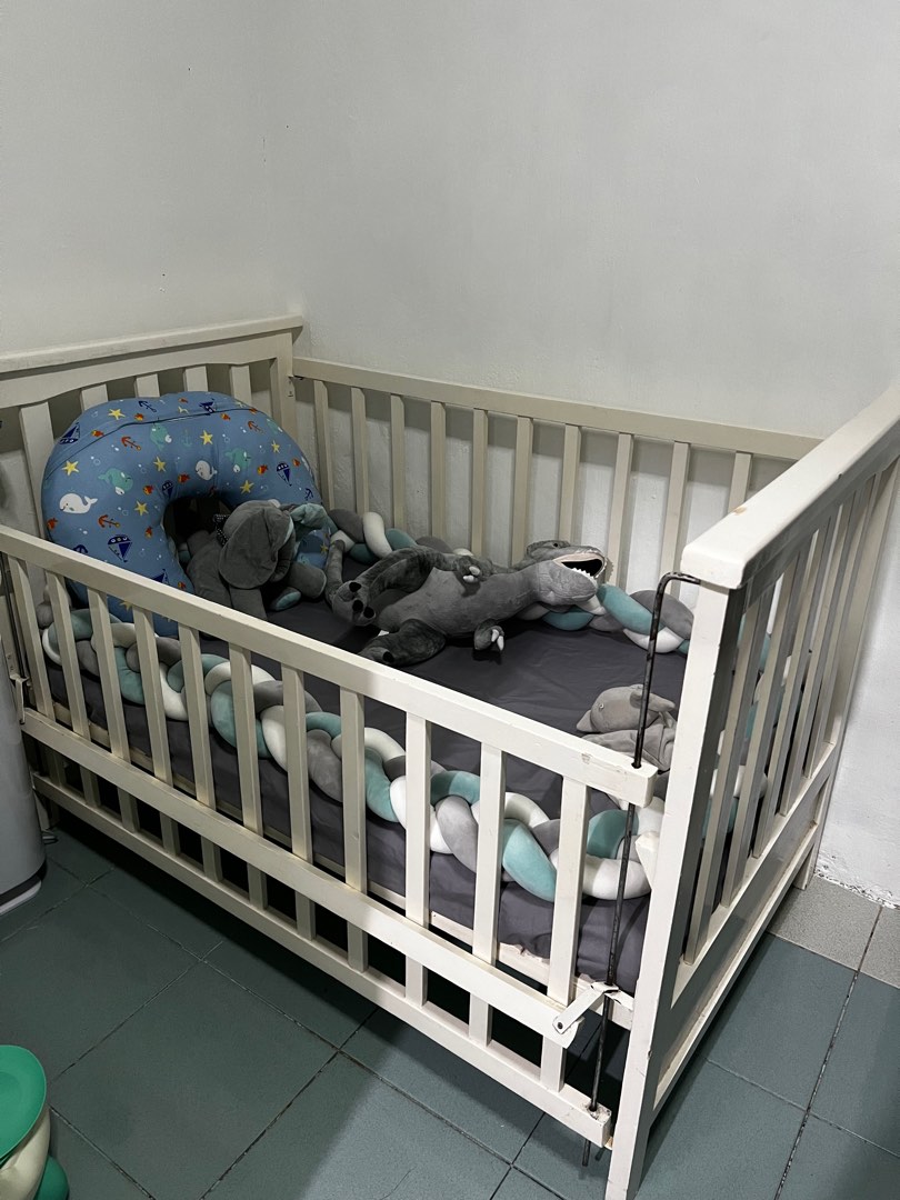 Crib with drop side set on Carousell