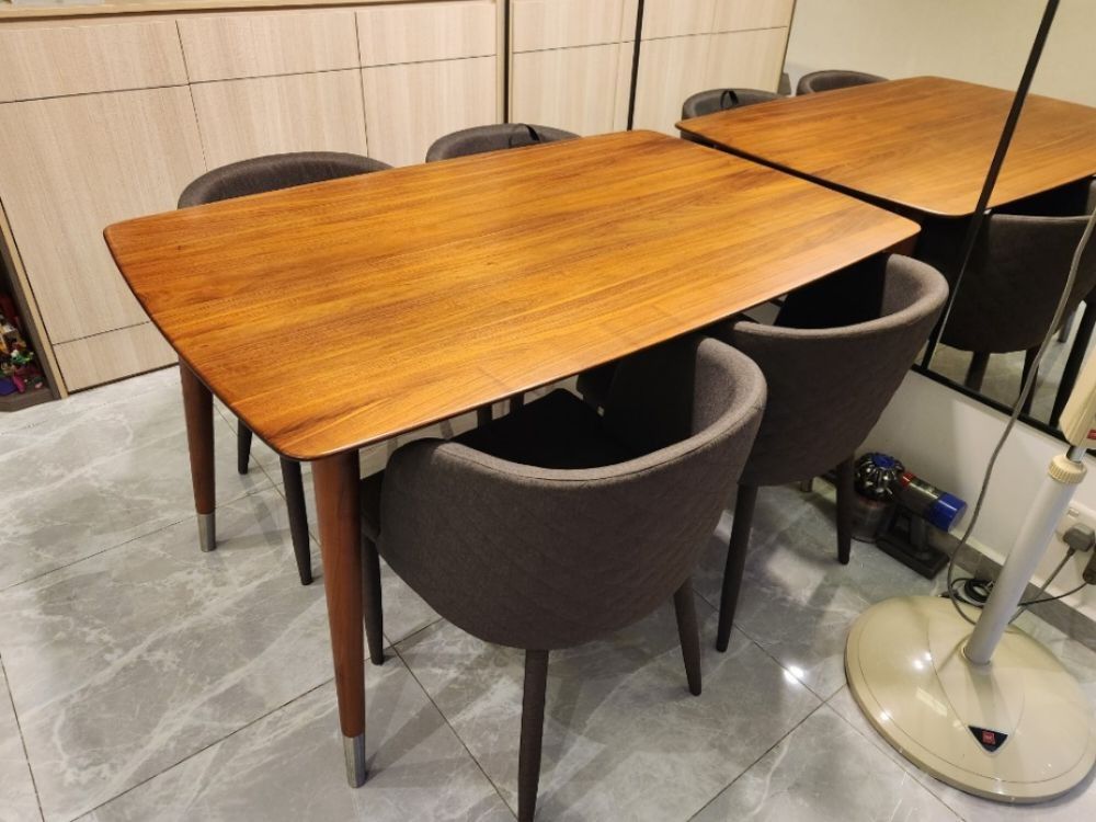 Dining set (Category: Tables & Sets) located in Singapore. Submitted by kjh1981 (Listing ID 1242280387, Image 2). Description: made of real wood. bought from prestige affairs dining table 1.4m length. with 4 dining chairs some light scratches. arrange delivery urself..