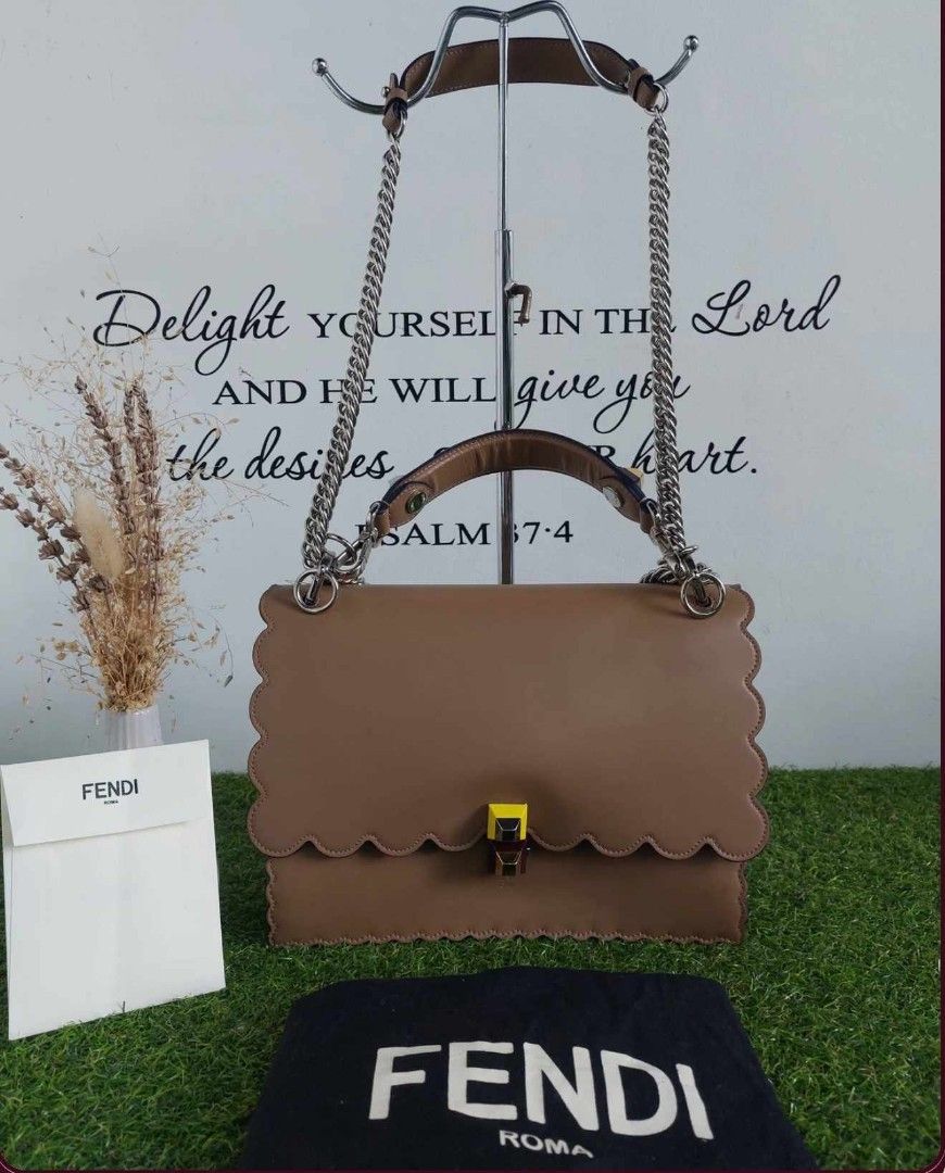 Fendi Kan Scalloped (Category: Luxury Bags & Wallets) located in Quezon City. Submitted by icedarren555 (Listing ID 1242277318, Image 1). Description: Fendi Kan Scalloped bag Color: Tan SHW 9/10 condition dustbag, booklet, entrupy included.