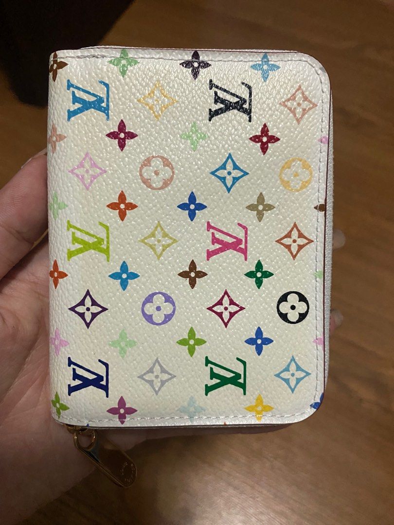 LV MULTICOLORE ZIPPY CARD HOLDER / WALLET (Category: Luxury Bags & Wallets) located in Manila. Submitted by decluttersbylim (Listing ID 1242312592, Image 2). Description: Hi! All items are authentic as I bought this from a online seller from JAPAN. For more details, kindly pm. Thank you! .