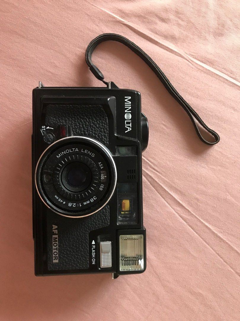 MINOLTA HI-MATIC AF2-MD (Category: Cameras) located in Quezon City. Submitted by marchjo (Listing ID 1242248249, Image 1). Description: *Flash working * Clean lens COSMETICS: 8.8/10 needs cleaning lang ISSUE: stuck shutter button - needs CLA lang, this is my personally use and I don't have the time to get it CLA'D RFS: di na ginagamit I can send you sample shots captured by this specific camera. negotiable for sure buyer. .