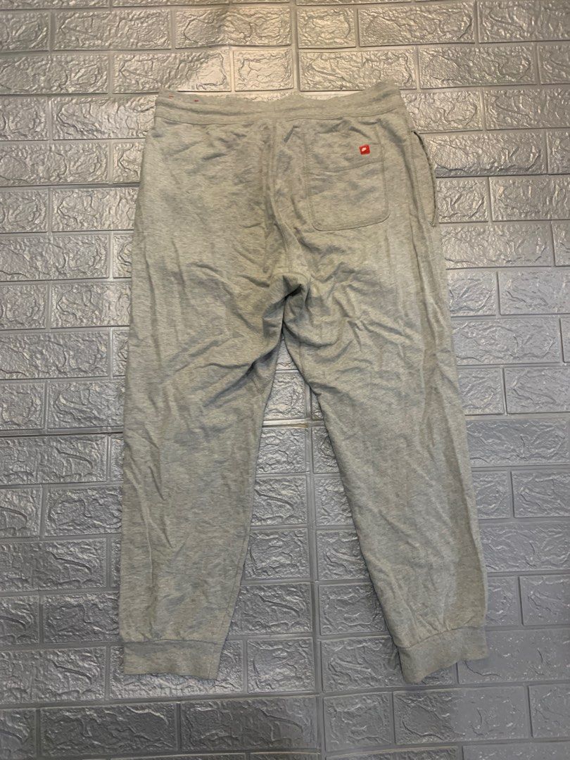 nike jogger pants red tag