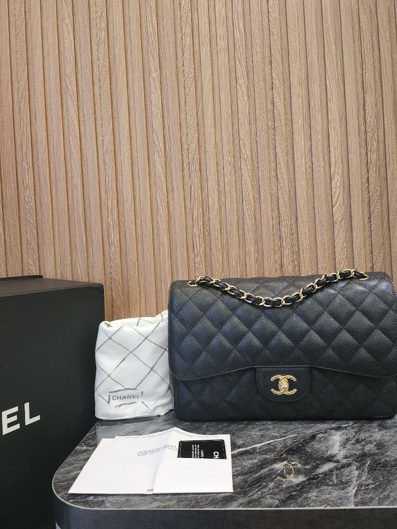 Chanel Black Caviar Jumbo Classic Flap Bag ○ Labellov ○ Buy and