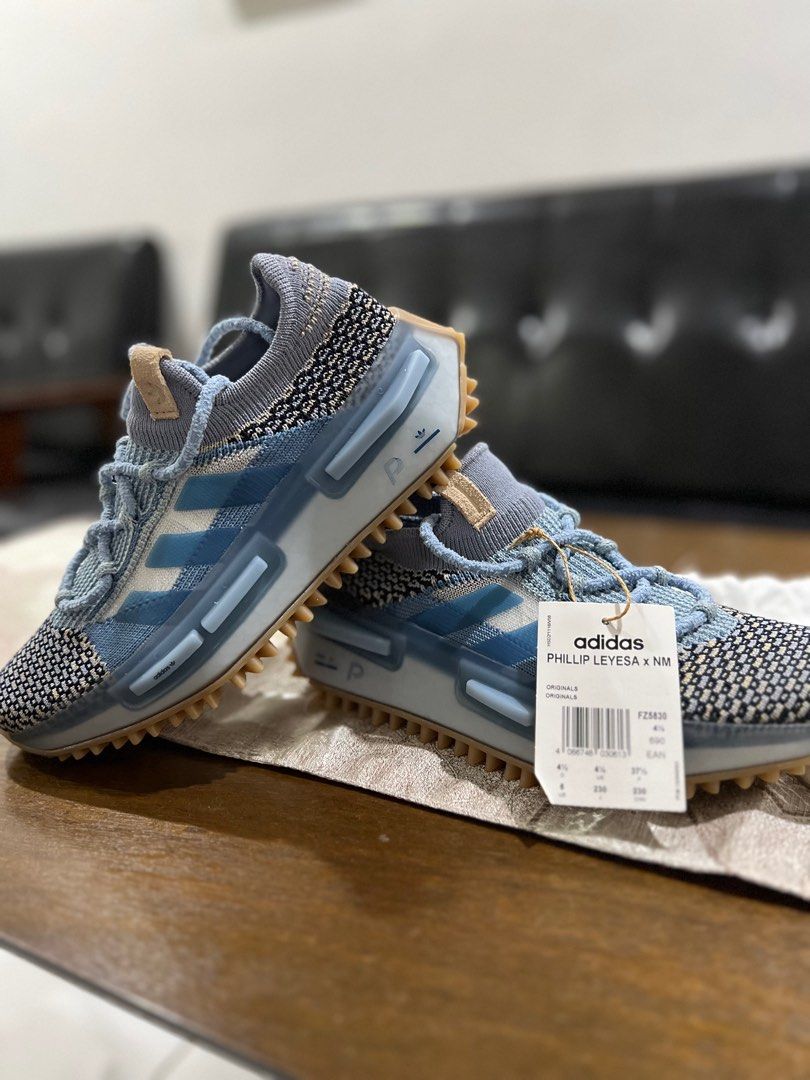 Nmd_r1 stlt sales rubber-trimmed primeknit sneakers