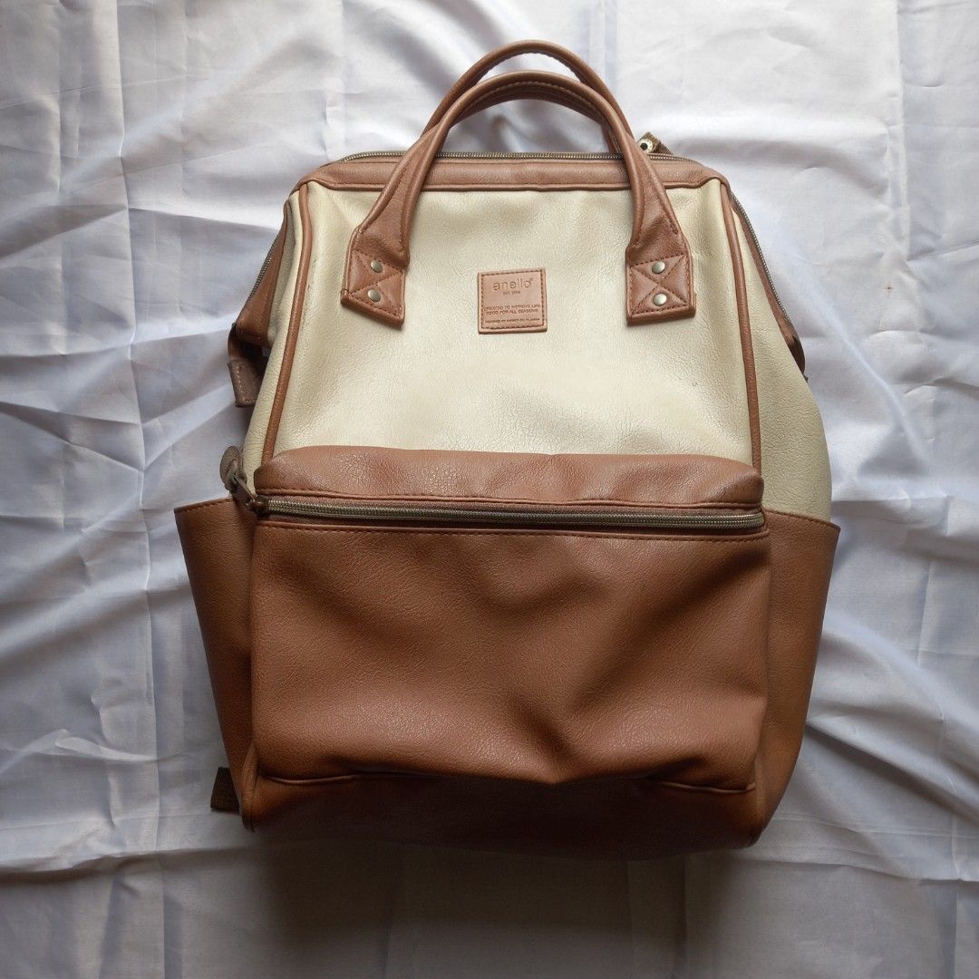anello camel leather regular sized backpack Anello Two Tone Leather Backpack Ivory/Camel Regular Size, Women's Fashion,  Bags & Wallets, Backpacks on Carousell