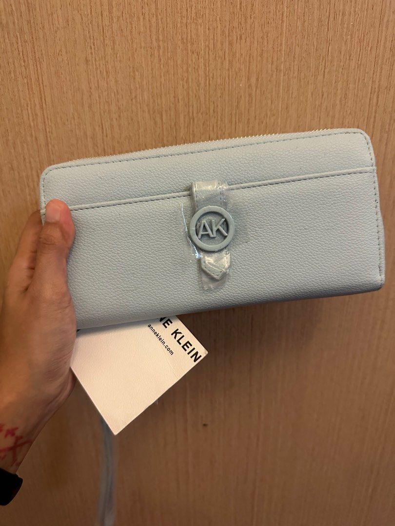 BNEW ANNE KLEIN WALLET WITH STRAP (Category: Wallets & Card holders) located in Quezon City. Submitted by StopNShop (Listing ID 1242456293, Image 1). Description: Brand new Anne Klein Wallet no box but with tag! Never Used.