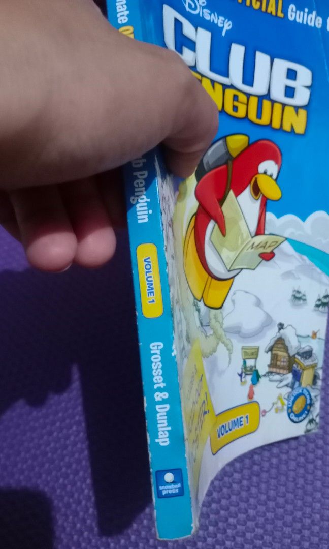 Disney Club Penguin (Category: Children's Books) located in Makati City. Submitted by decluttering_stuff101 (Listing ID 1242475430, Image 2). Description: still in excellent condition sa loob. only yung cover ang ang may signs of use..