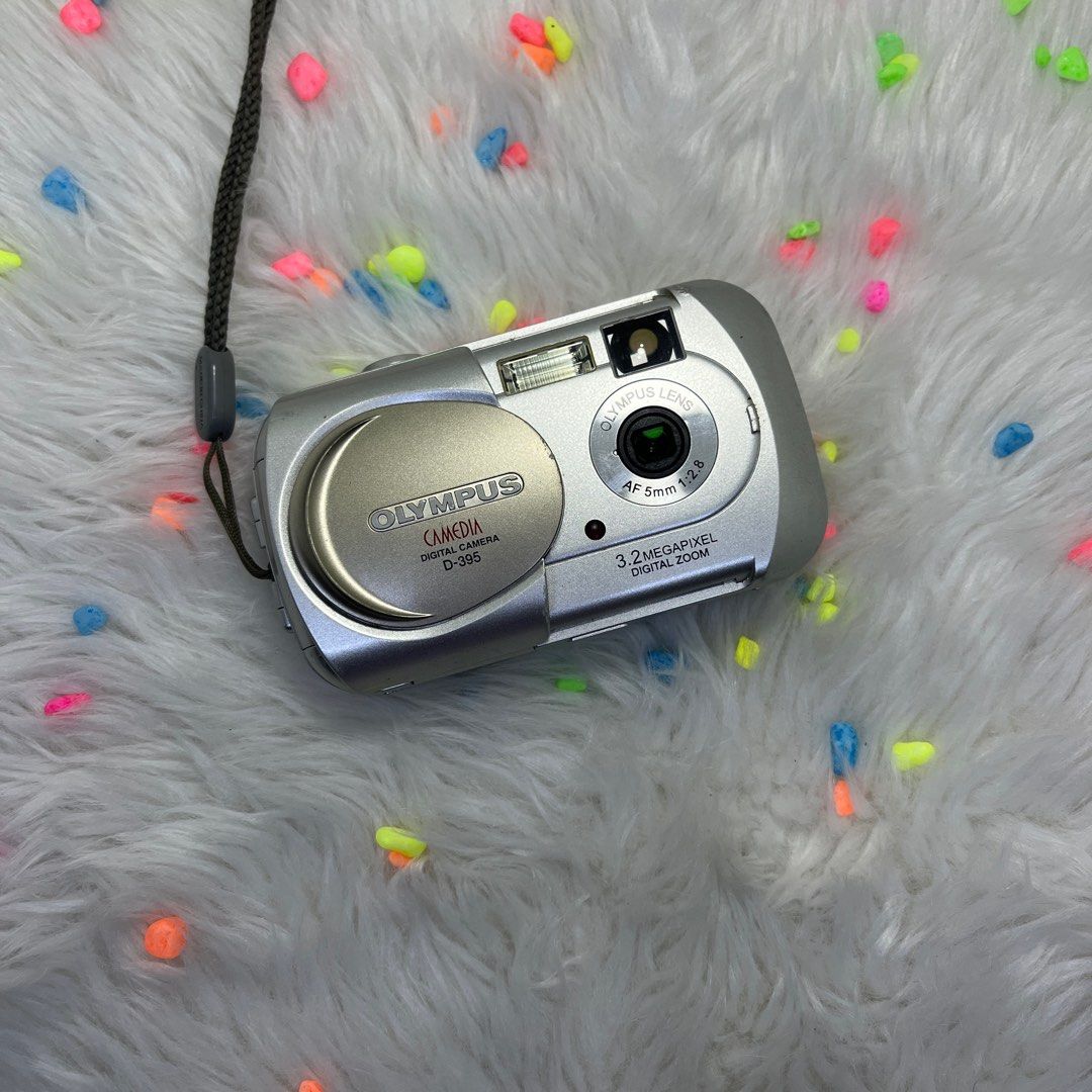 Olympus Camedia D-395 Digital Camera (Category: Cameras) located in Manila. Submitted by mmeowsz (Listing ID 1242493909, Image 2). Description: ✧˖° Olympus Camedia D-395 ⤷ ₱4,500 ⤷ fully functional ⤷ inclusions: sd card, strap, unit ⤷ only issue: burnt lcd screen • 3 3 Megapixels for up to 8x10-inch prints and larger • 33mm (35mm equiv.) F2.8 lens • 2.5X Digital Zoom • Auto-focus system • Durable plastic body • 1.5" high resolution LCD • PictBrid