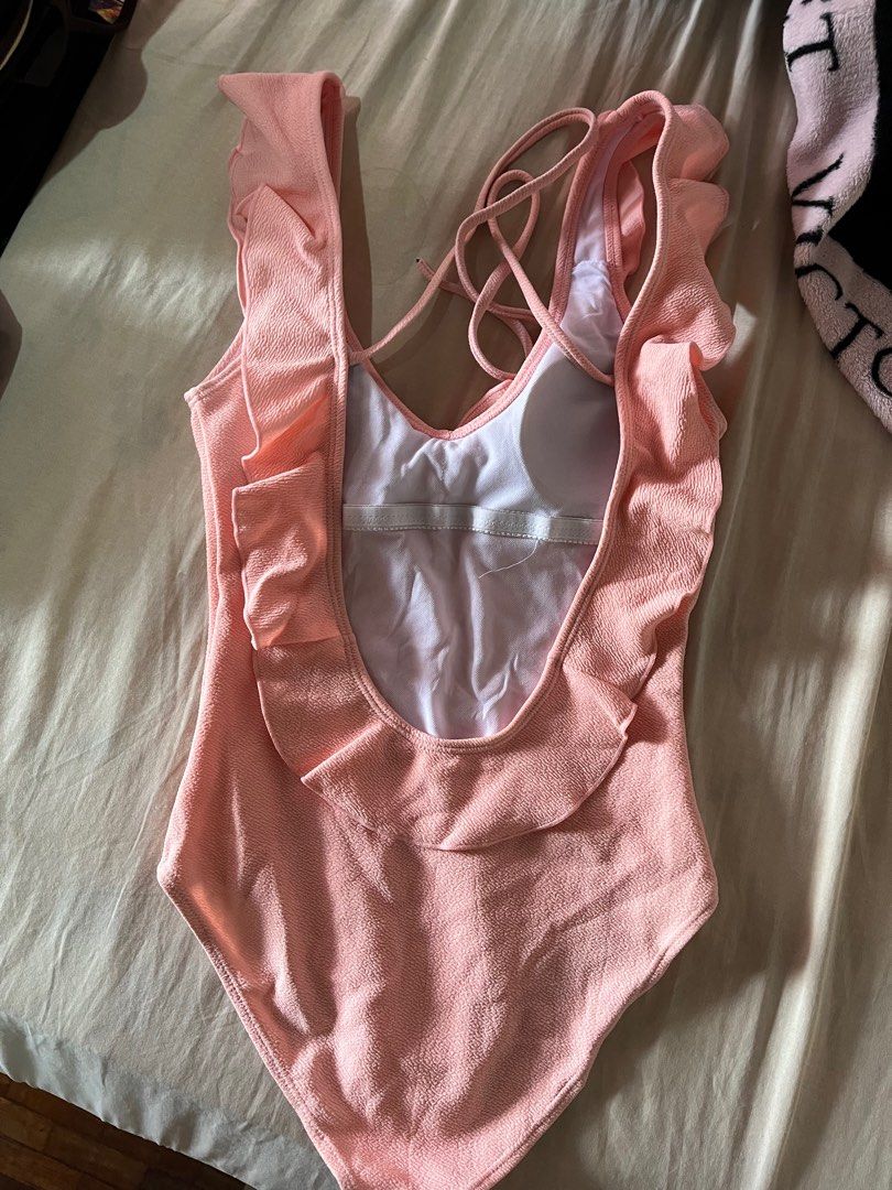 Pink 1-piece swimsuit (Category: Bikinis & Swimsuits) located in Quezon City. Submitted by leisdeclutter (Listing ID 1242367433, Image 2). Description: SIZE: medium STRETCH: slight - bought from shopee live - haven’t been used yet - really loved this pero hindi na kasya sakin, hindi ko siya nasuot man lang :( - pm me for more inquiries! rfs: declutter.