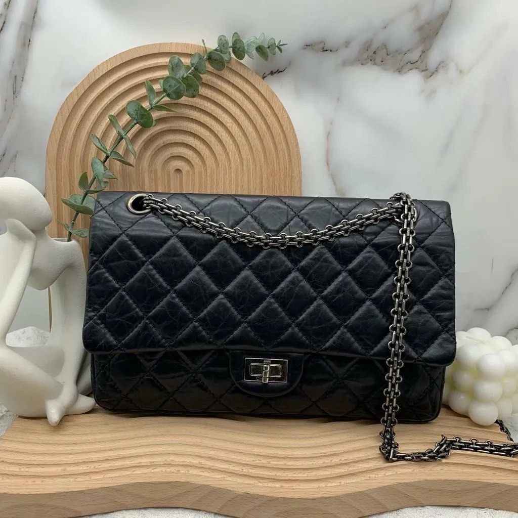 chanel silver quilted bag black