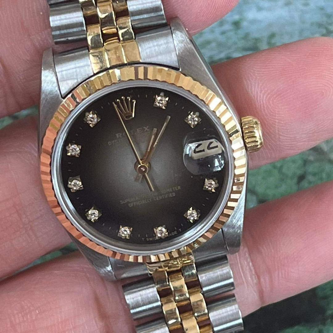 Rolex date just junior size 31mm black vignette (Category: Luxury Watches) located in Quezon City. Submitted by authenticandluxury_bags (Listing ID 1242422210, Image 1). Description: Rolex date just junior size 31mm black vignette costom With diamonds 💎 two tone 18k/ss 1987 model up ik very good running condition rush 379k only.