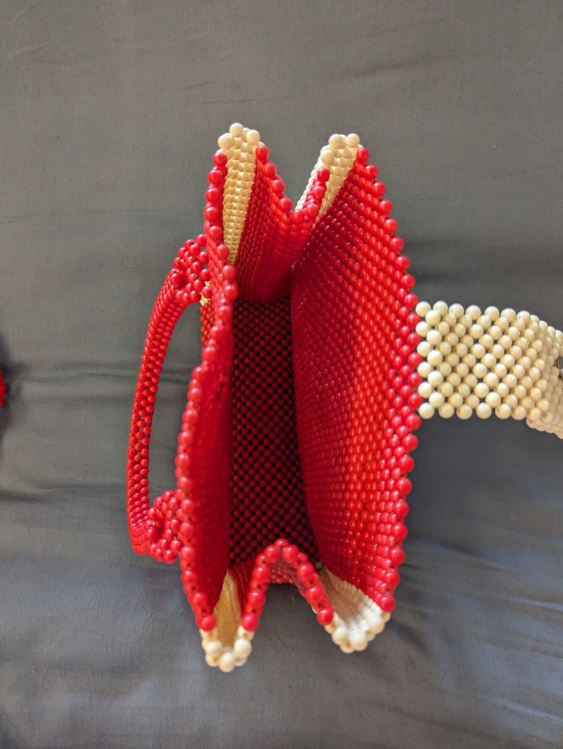Seek the Uniq Red Beaded Bag (Category: Purses & Pouches) located in Pasig City. Submitted by ineedclosetspacepls (Listing ID 1242381860, Image 3). Description: Bought for P3,750.
