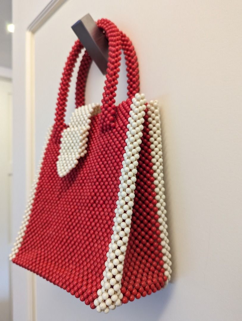 Seek the Uniq Red Beaded Bag (Category: Purses & Pouches) located in Pasig City. Submitted by ineedclosetspacepls (Listing ID 1242381860, Image 2). Description: Bought for P3,750.