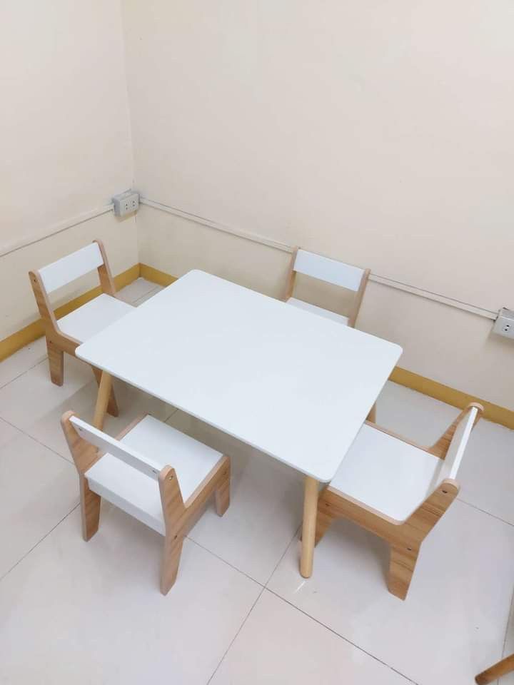 Table and chairs set for kids (Category: Tables & Sets) located in Quezon City. Submitted by wcfonlinestore (Listing ID 1242408305, Image 3). Description: Table and chairs set for kids This is perfect as study table for kids ages 1-6 years old. Sits up to 4 pax. Material is marine plyboard with sturdy solid pine wood legs. Size of study table: 60*80*44 cm LWH Size of Chair: 32*30*50 cm Very sturdy. Even adults can sit on it, Packaging Size: 91*11