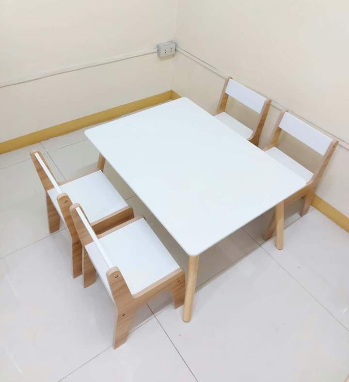 Table and chairs set for kids (Category: Tables & Sets) located in Quezon City. Submitted by wcfonlinestore (Listing ID 1242408305, Image 2). Description: Table and chairs set for kids This is perfect as study table for kids ages 1-6 years old. Sits up to 4 pax. Material is marine plyboard with sturdy solid pine wood legs. Size of study table: 60*80*44 cm LWH Size of Chair: 32*30*50 cm Very sturdy. Even adults can sit on it, Packaging Size: 91*11