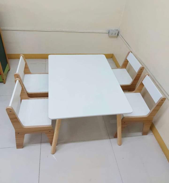 Table and chairs set for kids (Category: Tables & Sets) located in Quezon City. Submitted by wcfonlinestore (Listing ID 1242408305, Image 1). Description: Table and chairs set for kids This is perfect as study table for kids ages 1-6 years old. Sits up to 4 pax. Material is marine plyboard with sturdy solid pine wood legs. Size of study table: 60*80*44 cm LWH Size of Chair: 32*30*50 cm Very sturdy. Even adults can sit on it, Packaging Size: 91*11