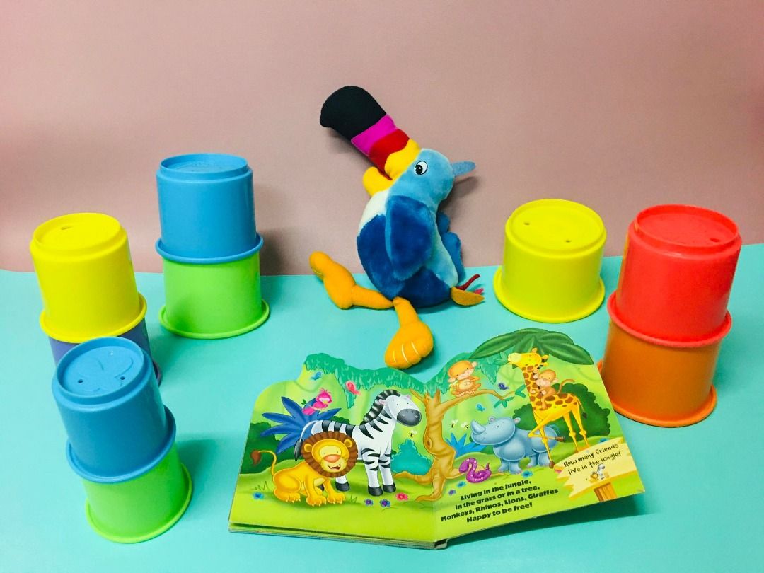 Toys r Us Stacking Cups with Fruit Loops Toucan Plush Toy Bundle Hobbies Toys Toys Games on Carousell