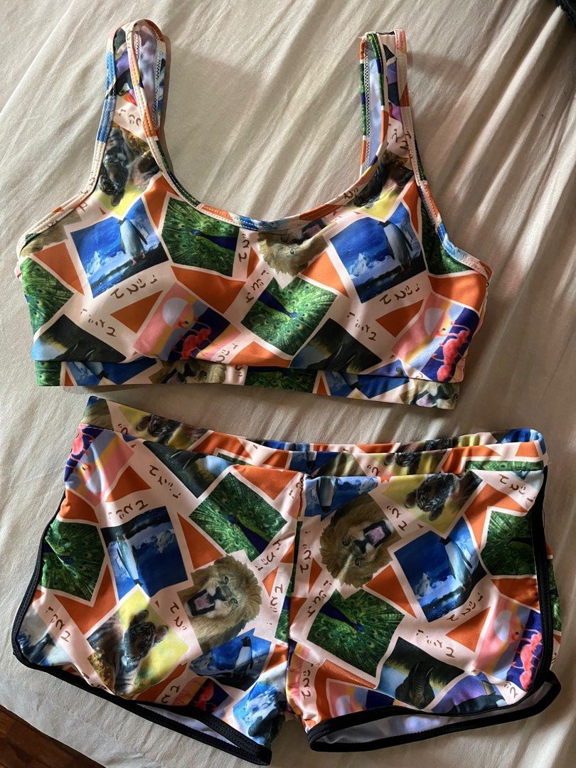 Two-piece animal theme swimsuit (Category: Bikinis & Swimsuits) located in Quezon City. Submitted by leisdeclutter (Listing ID 1242363062, Image 1). Description: SIZE: medium STRETCH: slight - bought from shopee live - haven’t been used yet - pm me for more inquiries! rfs: declutter.