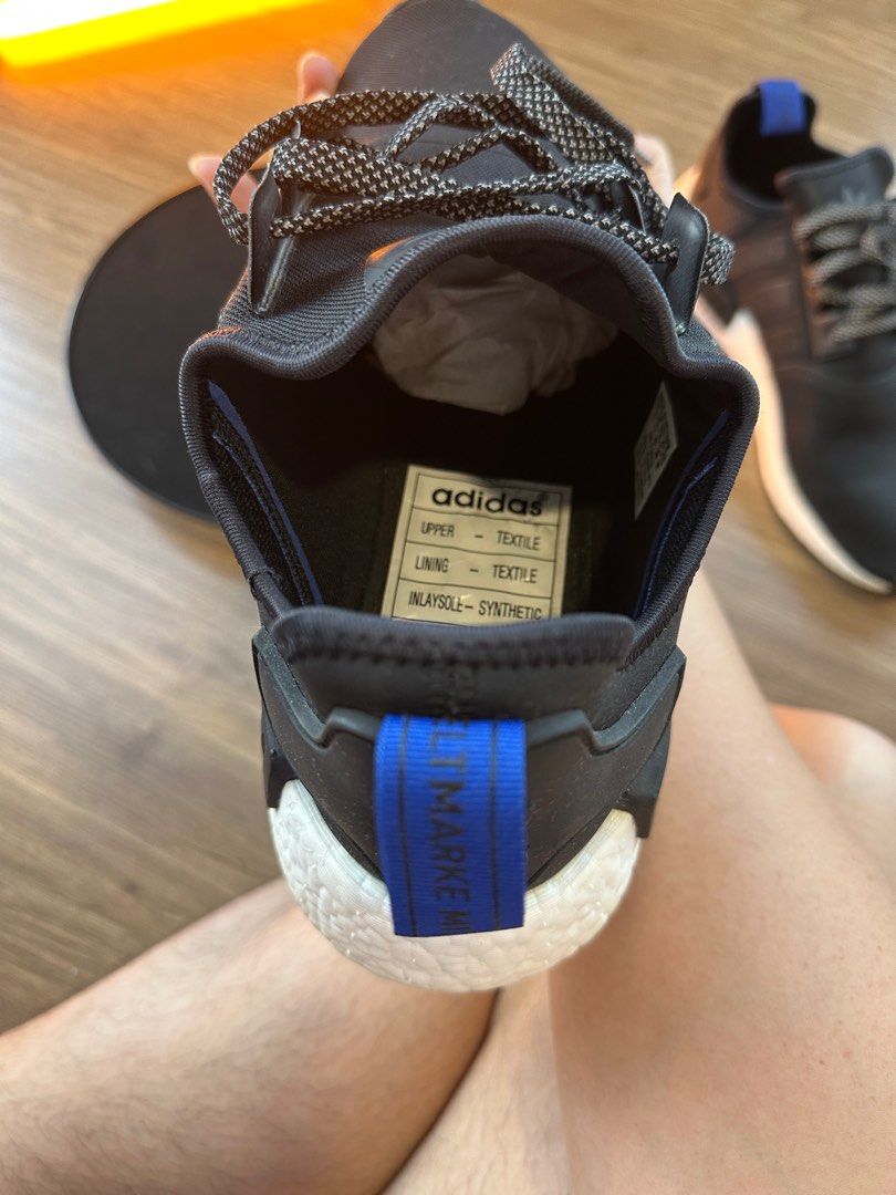 Black nmd blue tab 2025