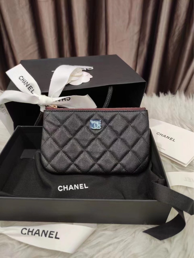 Pre-loved Chanel Mini O-case Pouch