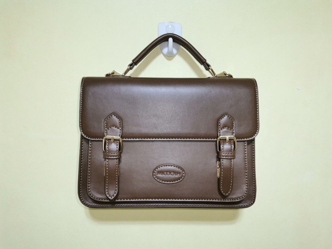 3 in 1 Cambridge Satchel Bag (Brown) (Category: Backpacks) located in Guiguinto. Submitted by mmhwo (Listing ID 1242698287, Image 1). Description: [LIGHTLY USED] 3 in 1 Cambridge Satchel Bag in Brown 📌 Orange App Checkout - J&T Express Delivery Measurements in cm : L-27, H-19, W-7 ✅ Original MICOCAH Brand ✅ Polyurethane (PU) Leather ✅ Can be used as a handbag ✅ Can be used as a backpack ✅ Can be used as a shoulder bag ✅ Can be used as a crossbod