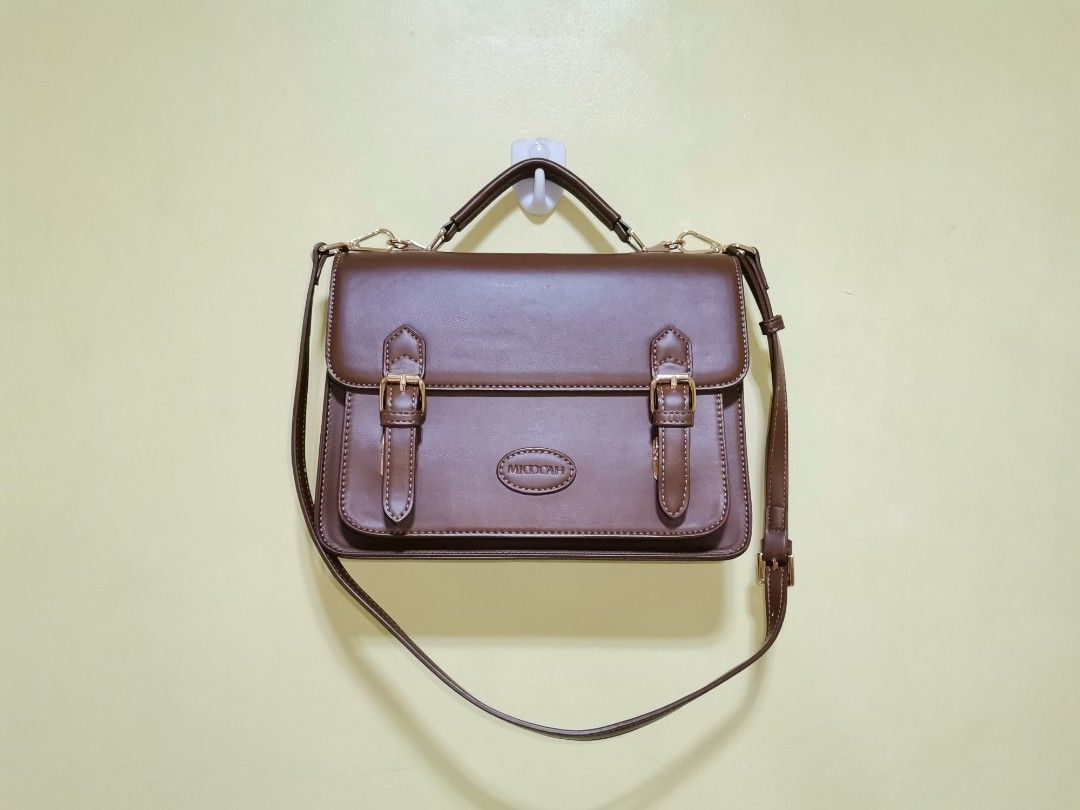 3 in 1 Cambridge Satchel Bag (Brown) (Category: Backpacks) located in Guiguinto. Submitted by mmhwo (Listing ID 1242698287, Image 3). Description: [LIGHTLY USED] 3 in 1 Cambridge Satchel Bag in Brown 📌 Orange App Checkout - J&T Express Delivery Measurements in cm : L-27, H-19, W-7 ✅ Original MICOCAH Brand ✅ Polyurethane (PU) Leather ✅ Can be used as a handbag ✅ Can be used as a backpack ✅ Can be used as a shoulder bag ✅ Can be used as a crossbod