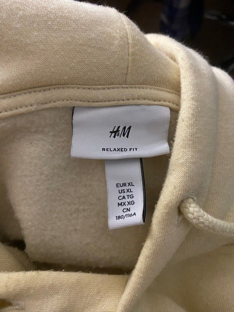 Hu0026M relaxed fit hoodie ( into the field ), Men's Fashion, Tops u0026 Sets,  Hoodies on Carousell