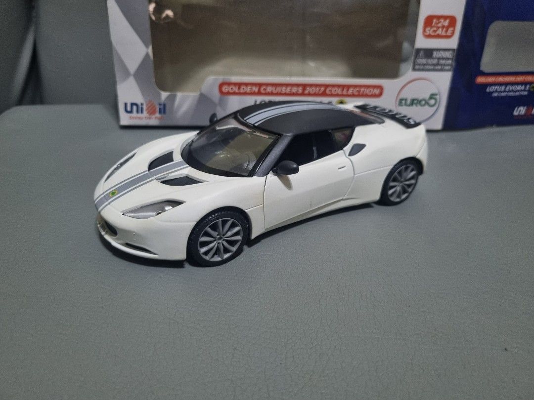 Lotus Evora S Unioil 1:24 (Category: Vehicle & Diecast Models) located in Silang. Submitted by samflores2k4t7 (Listing ID 1242640330, Image 2). Description: For sale Lotus Evora S Golden Cruisers 2017 collection By Unioil Scale 1:24 Back in box Good condition.