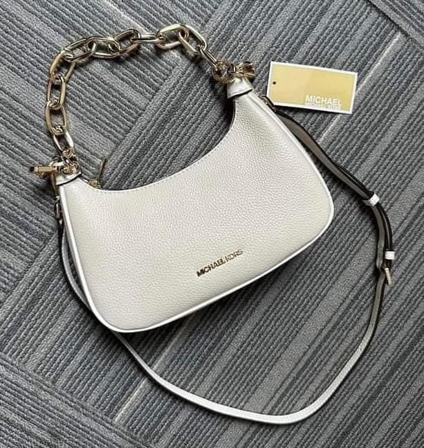 MK Mini Cora (Category: Luxury Bags & Wallets) located in Pasig City. Submitted by mgmanila (Listing ID 1242542504, Image 2). Description: MK Mini Cora Pouchette Dimensions: 7.5 in x 4 - 6 in x 2.5 in 3,200 ✔️Cash on Pickup (COP) via LBC available ✔️Cash on Delivery (COD) available within Metro Manila only ✔️MOP: Gcash,Maya And Bank transfer ✔️Shipping via Lalamove, Grab and Joyride ✔️Yes to Same day delivery🥰 ✔️Open for Layaway 📩DM us for more