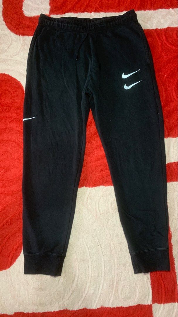 Nike double hotsell swoosh joggers red
