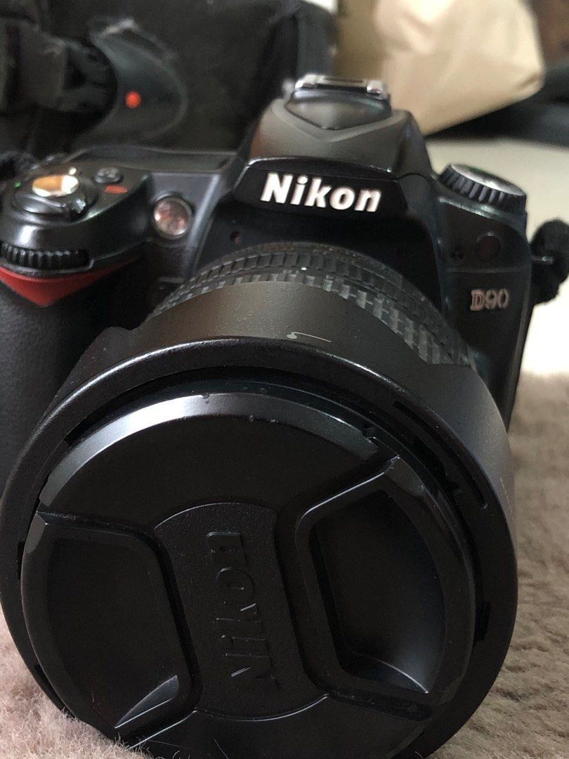 NIKON D90 (Category: Cameras) located in Consolacion. Submitted by claustings (Listing ID 1242621047, Image 1). Description: NIKON D90 SLIGHTLY NEGOTIABLE -used only for special events - only flaws are minor peels on the shutter button and error display on screen (swipe to see) - includes 2 lenses (3 overall including lens attached to camera), no damages - includes original charger and camera bag - bank transfer only!! (pm for more info or videos