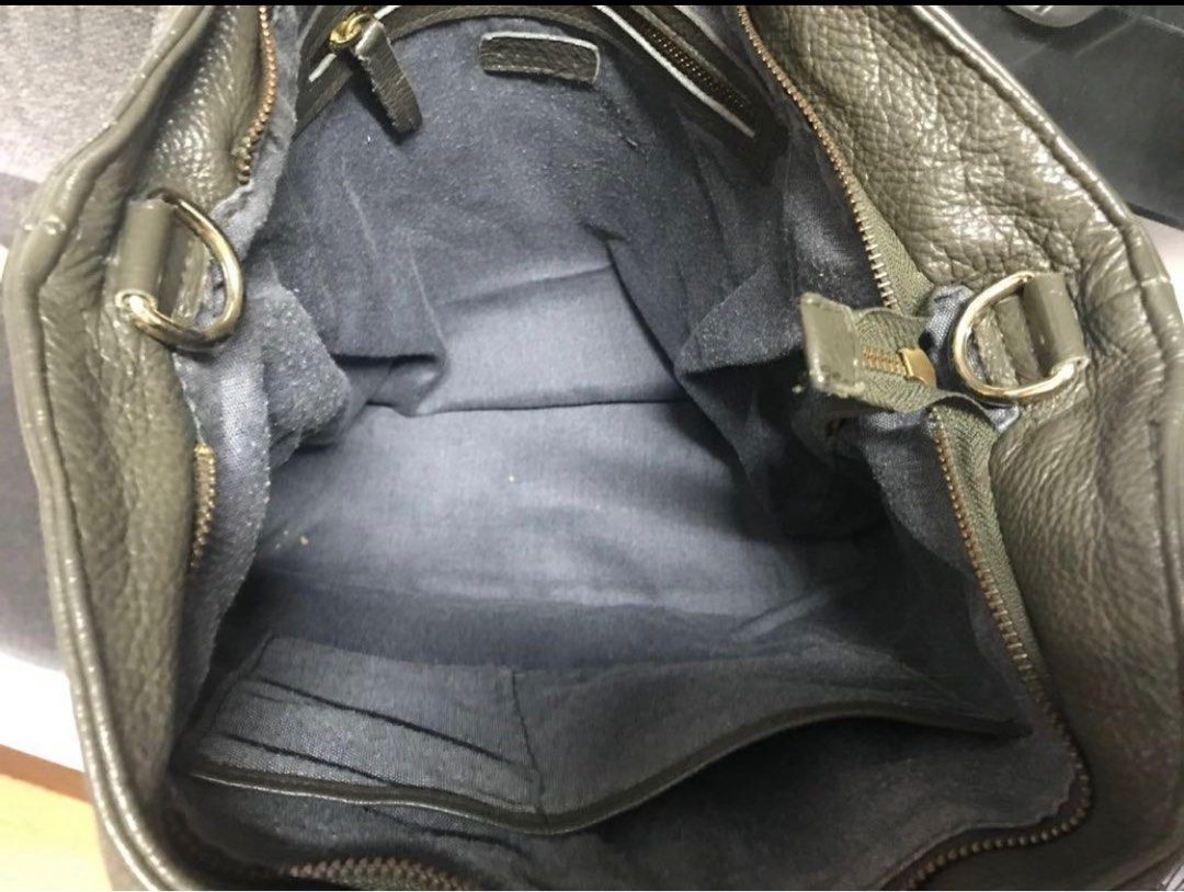 REPRICED PRAVI Samara 2in1 bag (Category: Shoulder Bags) located in Quezon City. Submitted by turak2020plus1 (Listing ID 1242553615, Image 3). Description: PRAVI Samara bag Shoulder to crossbody bag Olive grey color Authentic leather, ziptop, cloth lining, 3 interior pockets (1 zippered), detachable and adjustable strap Height: 13in, Width (base): 12in, Width (top): 17in, Depth: 5.5in, Handle drop: 9in Slightly used, in good condition..