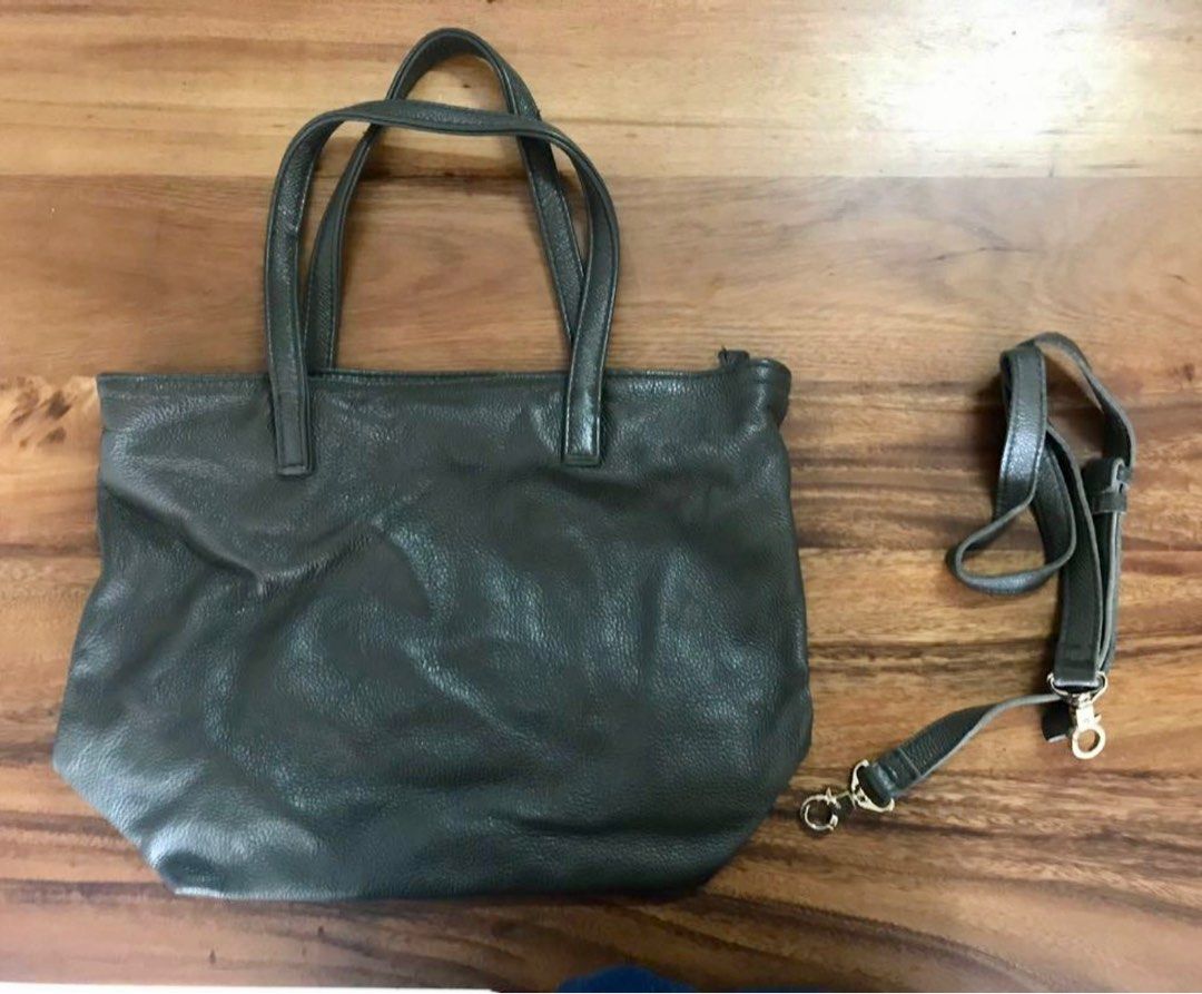 REPRICED PRAVI Samara 2in1 bag (Category: Shoulder Bags) located in Quezon City. Submitted by turak2020plus1 (Listing ID 1242553615, Image 2). Description: PRAVI Samara bag Shoulder to crossbody bag Olive grey color Authentic leather, ziptop, cloth lining, 3 interior pockets (1 zippered), detachable and adjustable strap Height: 13in, Width (base): 12in, Width (top): 17in, Depth: 5.5in, Handle drop: 9in Slightly used, in good condition..