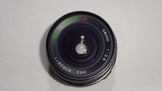 RMC Tokina 28mm f2.8 lens
manual olympus OM mount (metal)