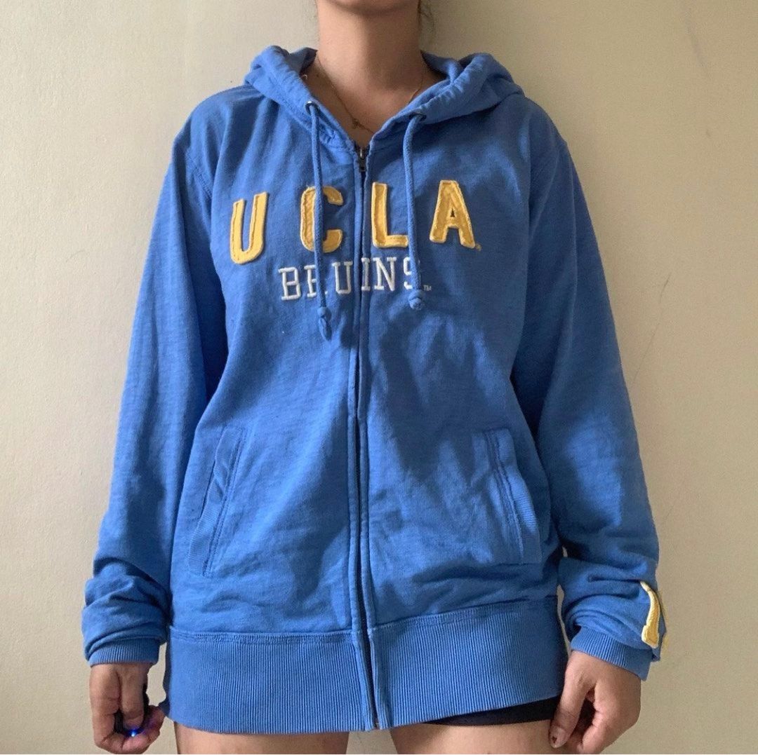 UCLA HOODIE JACKET (Category: Coats, Jackets and Outerwear) located in Muntinlupa City. Submitted by hun_thrift (Listing ID 1242604553, Image 1). Description: H30 Colosseum athletics ucla hoodie zip up jacket L on Tag • best fit small to semi med Length 24 Almost bnew! 100/100 good condition Excellent fabric!! ganda so much!! for keeeeeps 🫶🏻🥹 .