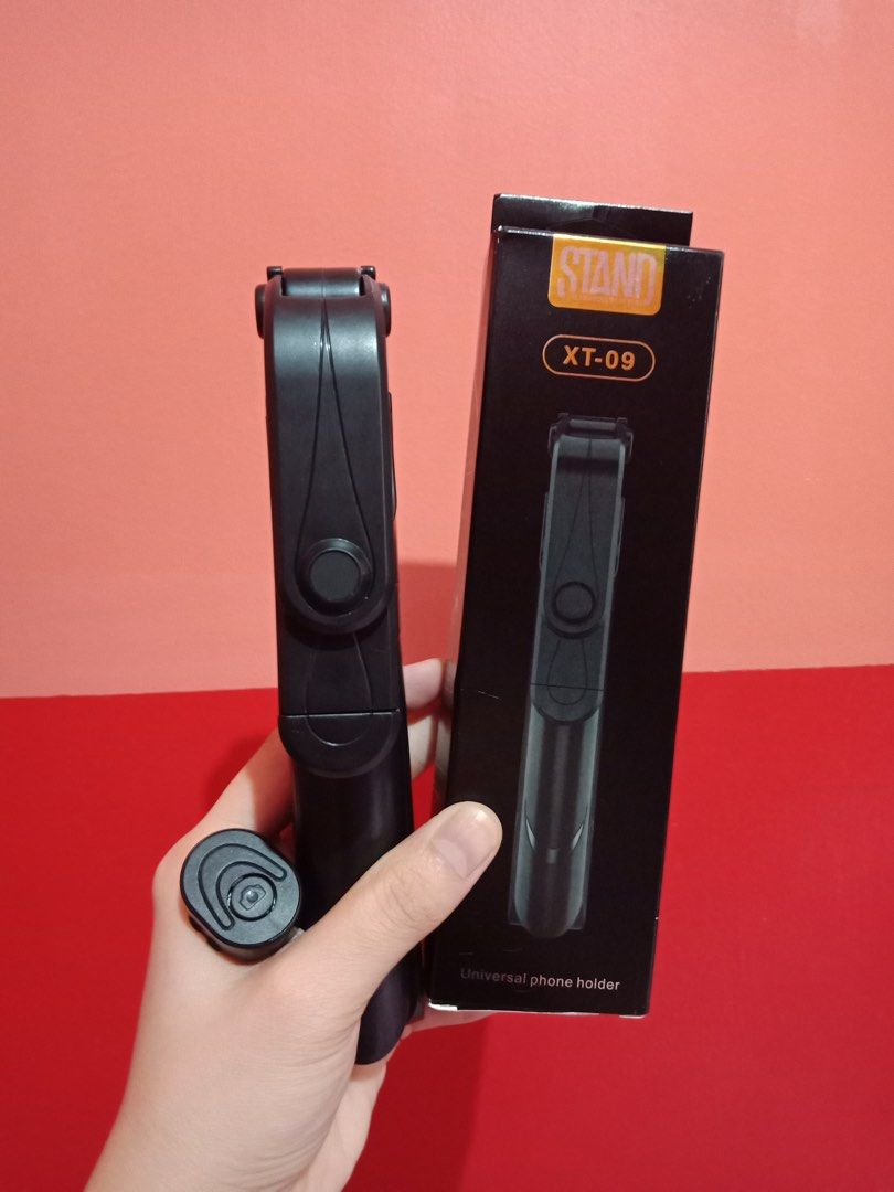 Bluetooth Selfie Stick and tripod in one extendable with Wireless Remote Control Shutter (Category: Tripods & Monopods) located in Rizal. Submitted by czarinashop (Listing ID 1242832999, Image 2). Description: Bluetooth selfie stick and tripod in one with remote control shutter for Iphone / Android Phone Compact design, 18.6cm after folding so very convenient to carry Extendable selfie stick can be stretched from 19cm to 80cm.