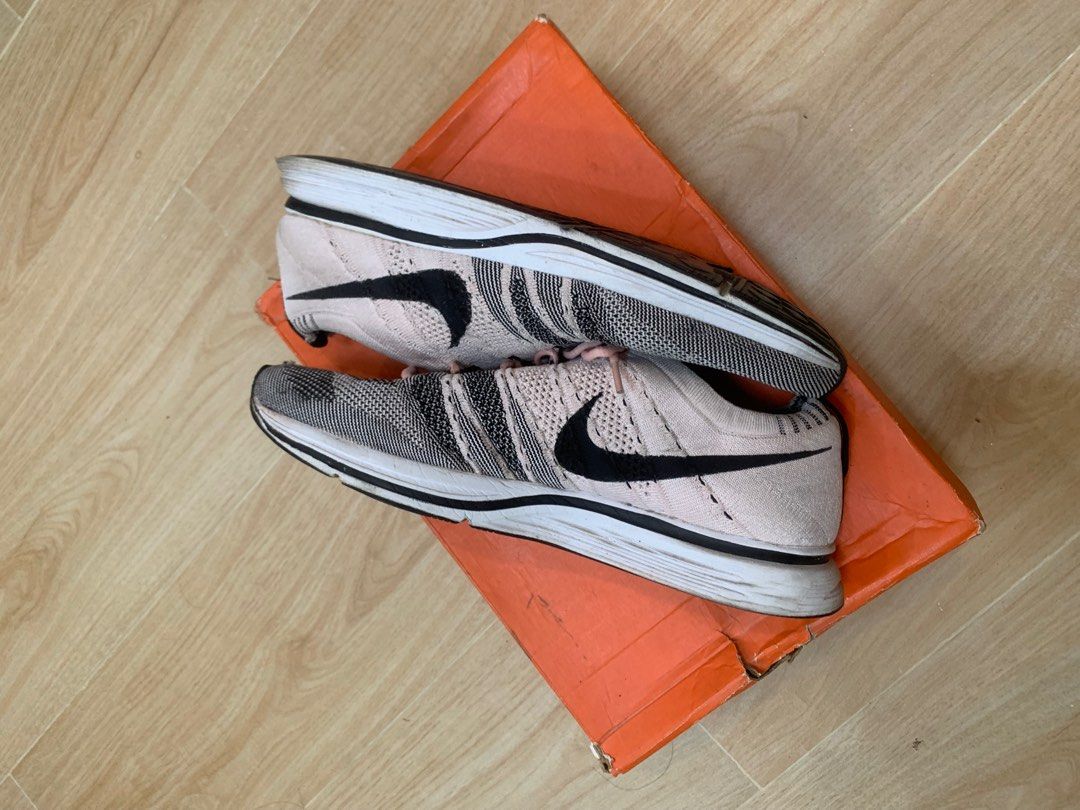 Pink flyknit trainer hot sale