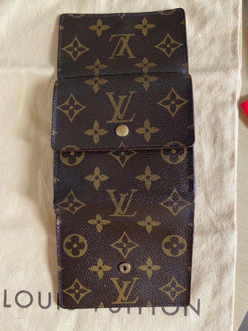 LV Elise Monogram Compact Wallet (Category: Luxury Bags & Wallets) located in Bulacan. Submitted by thedeclutteringmom (Listing ID 1242790725, Image 3). Description: Guaranteed original Money back if proven fake Vintage LV wallet in monogram In very good condition Bright print of lv on leather Working buttons minimal dry part at bill slot Signs of use but does not affect the appearance of the wallet (pls see last pic) Datecode : TH1905 Made in Fr