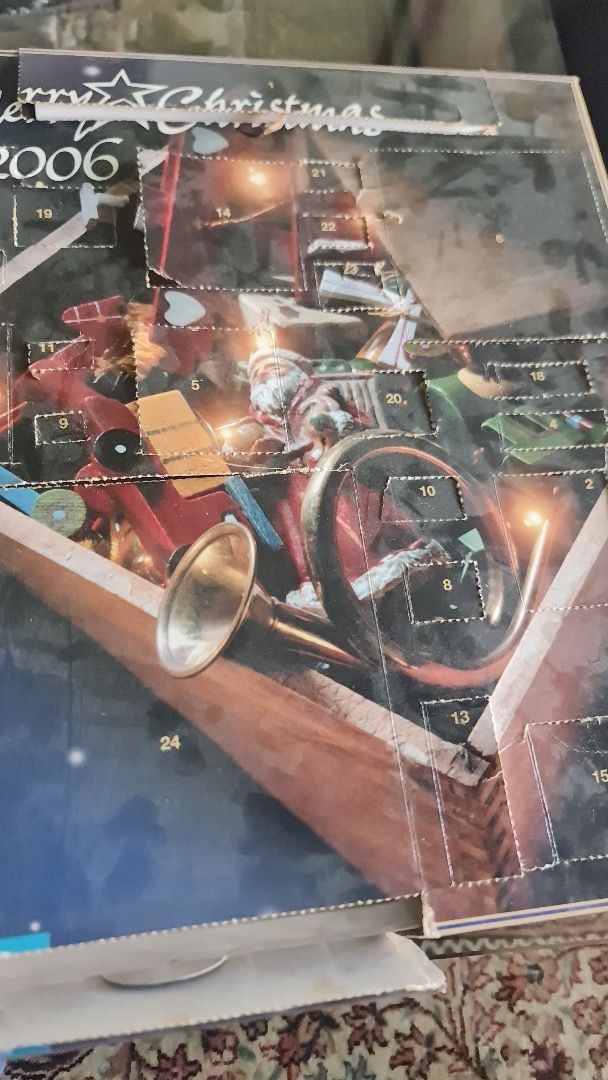 Opened Herpa Advant calendar Each forms model set up and the models