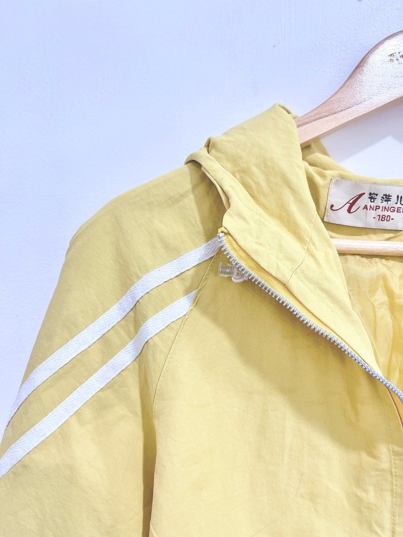 Pastel yellow windbreaker sale