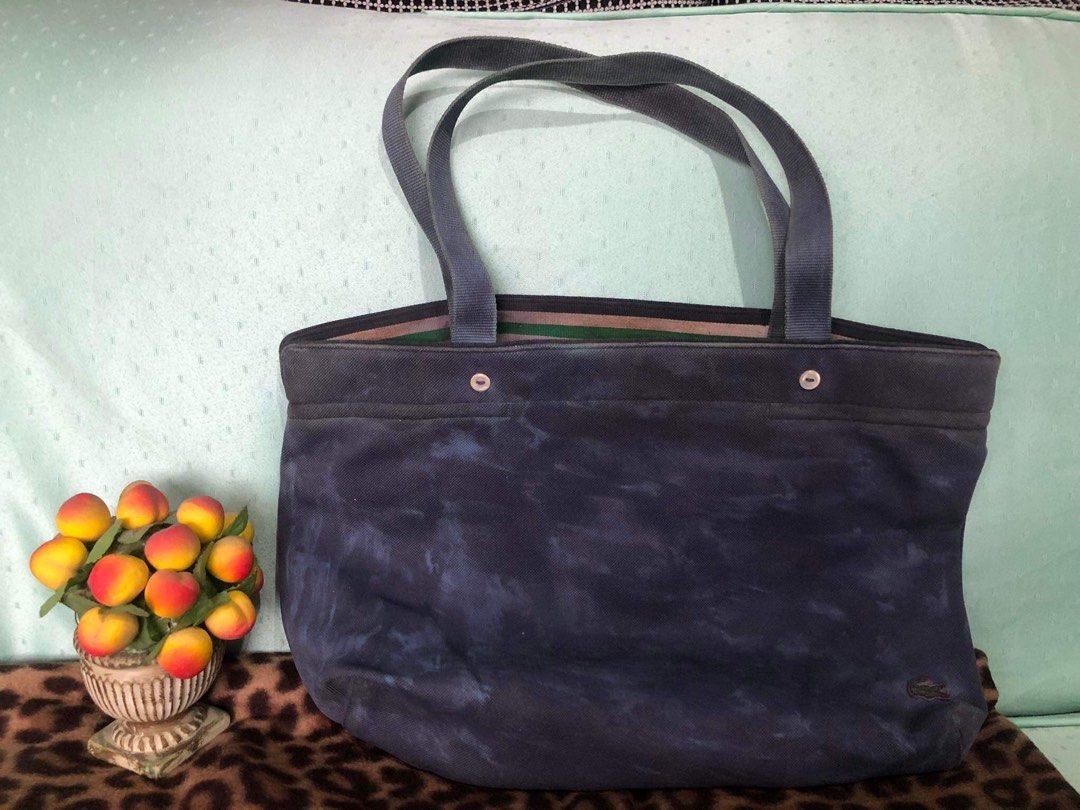 Preloved Original Lacoste bag (Category: Luxury Bags & Wallets) located in Manila. Submitted by frugalfinds89 (Listing ID 1242834122, Image 1). Description: Preloved 💯Authentic Lacoste bag bought in Rockwell Store for 8500 Needs handwashing kasi naka stock lng sa storage room Please expect sign of usage RFS: Decluttering .