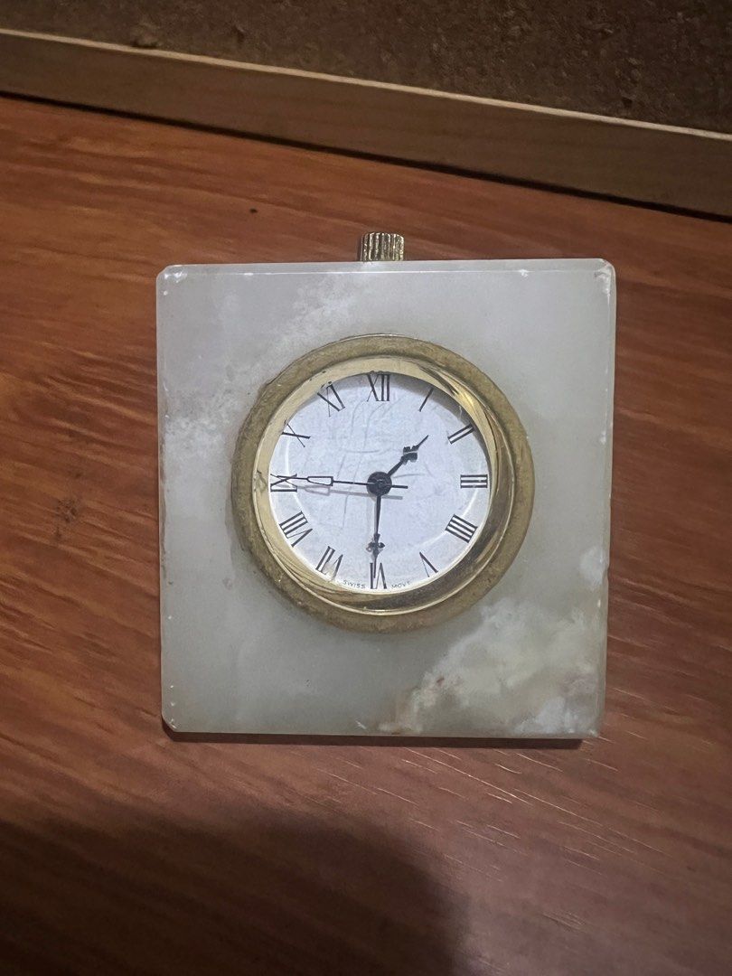 Swiss made desk clock (Category: Clocks) located in Malabon City. Submitted by 168raymond (Listing ID 1242722341, Image 1). Description: Swiss made Desk clock Good working Order One day wind Onyx marble Location Potrero Malabon .